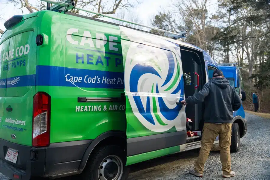 Technician in front of Cape Heating AC & Electric van on Cape Cod, MA.